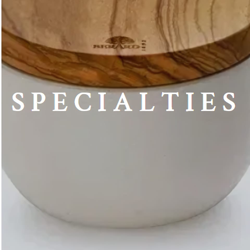 White bowl with a wooden lid, featuring the word "SPECIALTIES" in white text.